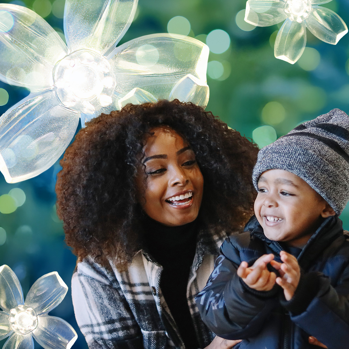 Mother and child surrounded by blue-green lights